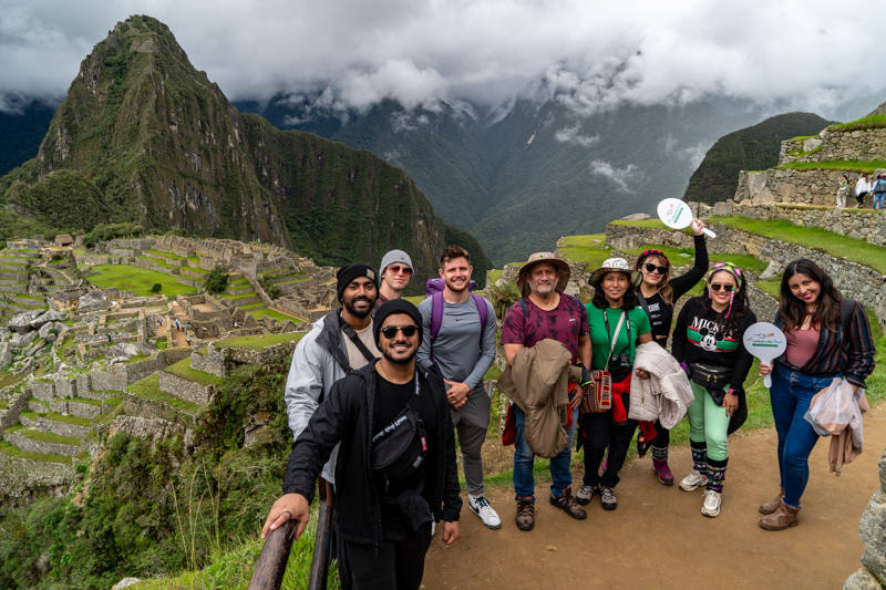 Machu Picchu Tourists resting in Machu Picchu