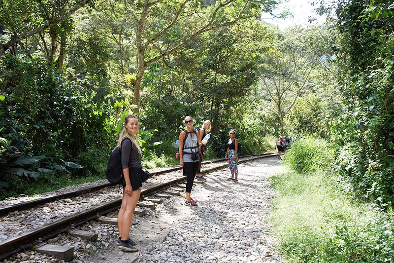 Hydroelectric Route to Aguas Calientes Tourists following the hydroelectric route to Aguas Calientes