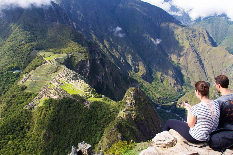 Top of the Huayna Picchu mountain Tourist on top of Huayna Picchu