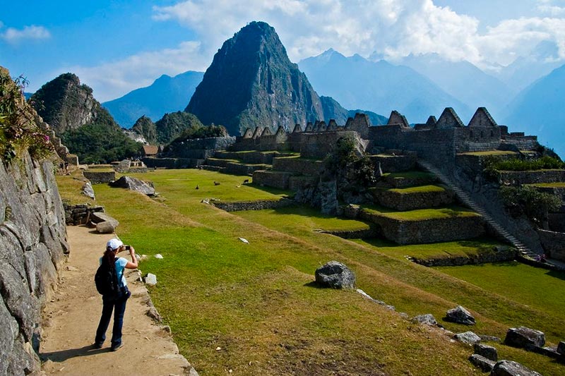 Tourist at the Inca citadel of Machu Picchu